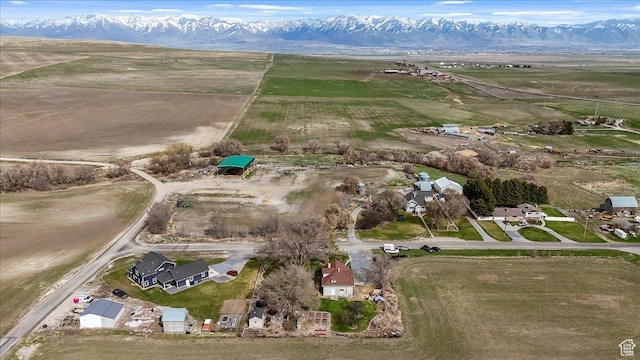 birds eye view of property with a rural view and a mountain view