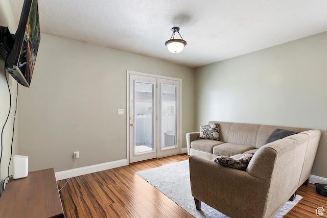 6761 S High Bluff Dr W, West Jordan, UT 84084 - living area with baseboards and wood finished floors