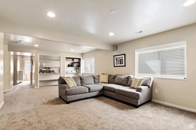 6761 S High Bluff Dr W, West Jordan, UT 84084 - living area with light colored carpet, visible vents, and recessed lighting