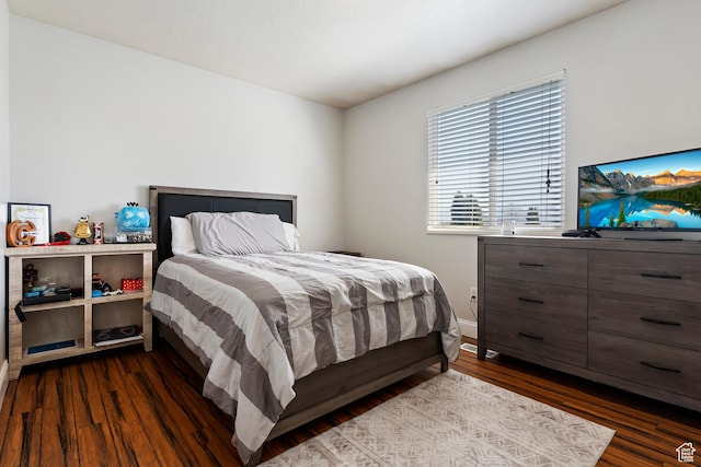 6761 S High Bluff Dr W, West Jordan, UT 84084 - bedroom with dark wood-style floors and baseboards