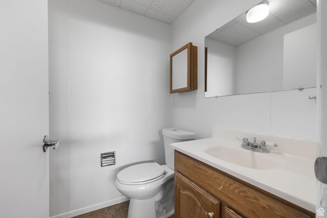 3481 S 3530 E, Salt Lake City, UT 84109 - bathroom featuring vanity, a drop ceiling, baseboards, and toilet