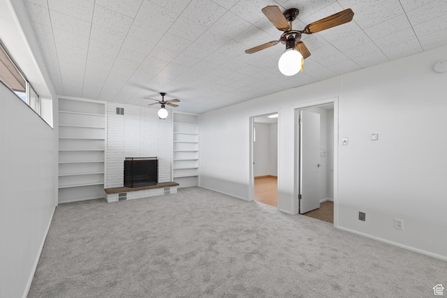 3481 S 3530 E, Salt Lake City, UT 84109 - unfurnished living room with ceiling fan, a fireplace, baseboards, and carpet floors