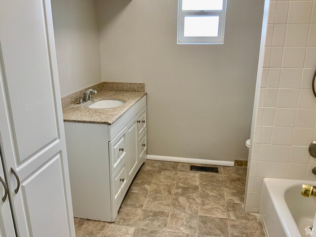 165 W 500 N, Richfield, UT 84701 - bathroom with vanity and washtub / shower combination