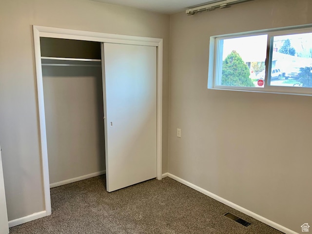 165 W 500 N, Richfield, UT 84701 - unfurnished bedroom featuring carpet floors, a closet, and baseboards
