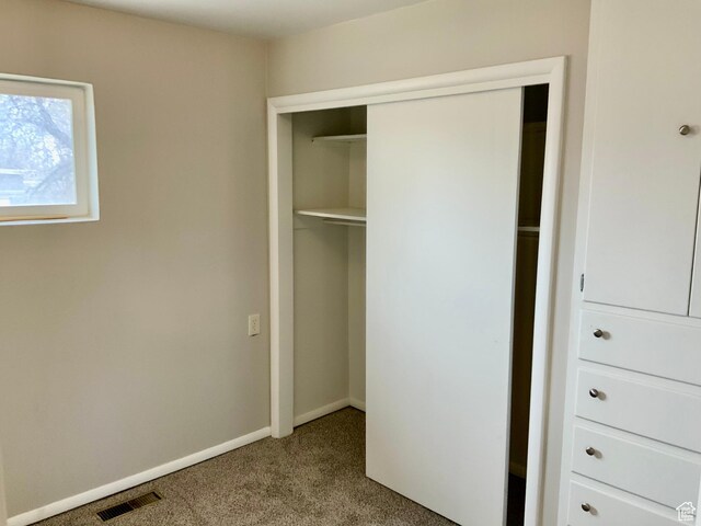 165 W 500 N, Richfield, UT 84701 - unfurnished bedroom with carpet, a closet, and baseboards