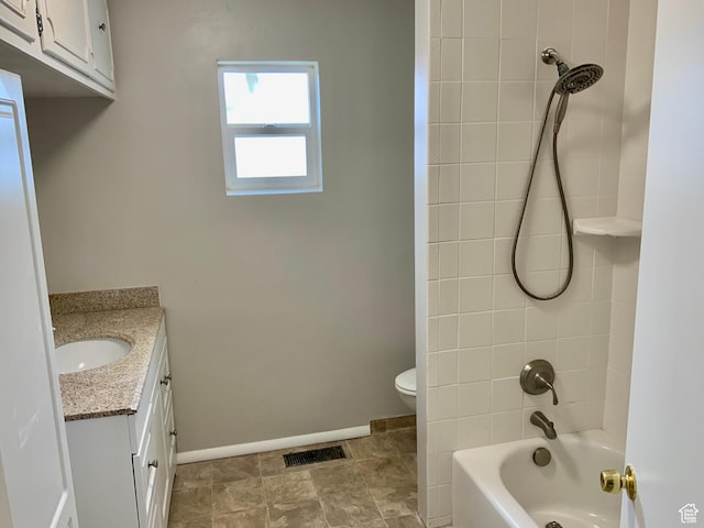 165 W 500 N, Richfield, UT 84701 - bathroom featuring vanity, toilet, shower / tub combination, and baseboards