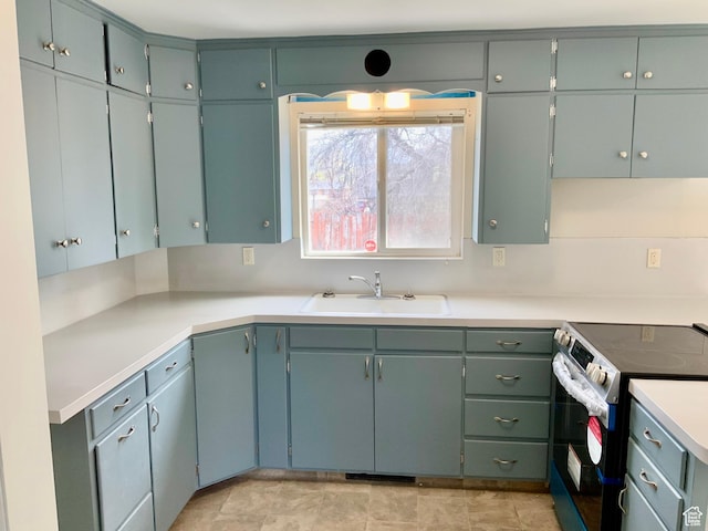 165 W 500 N, Richfield, UT 84701 - kitchen featuring electric stove, a sink, and light countertops