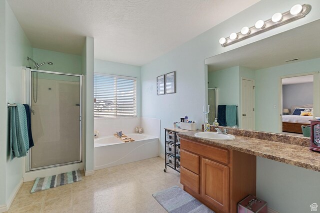 4687 E Jordan Way, Eagle Mountain, UT 84005 - ensuite bathroom featuring a shower stall, connected bathroom, vanity, and a garden tub