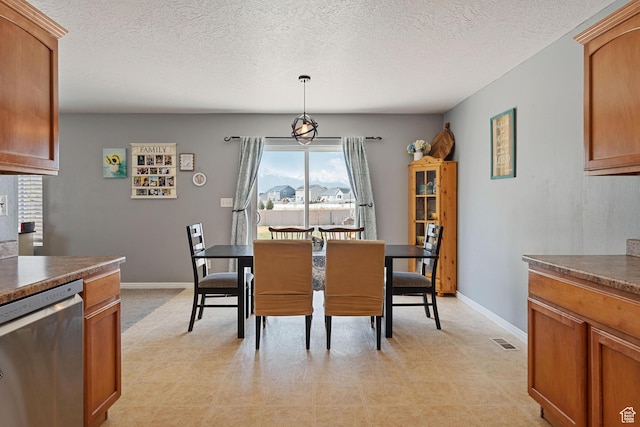 4687 E Jordan Way, Eagle Mountain, UT 84005 - dining area with visible vents, baseboards, light floors, and a textured ceiling