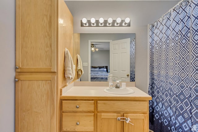 1021 E Riverbend Ln S, Ogden, UT 84404 - ensuite bathroom with ensuite bathroom, ceiling fan, curtained shower, and vanity
