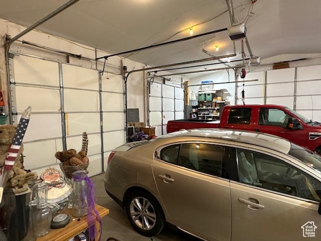 garage featuring a garage door opener