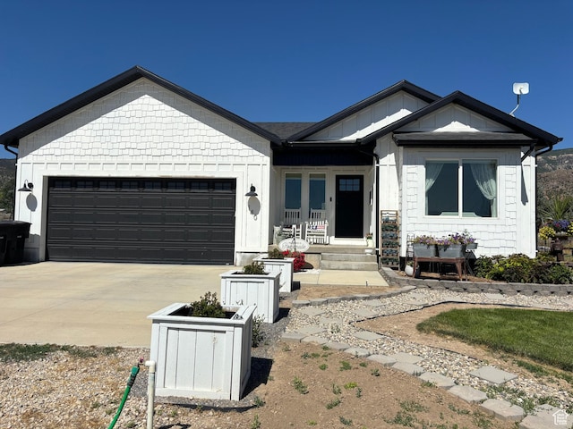 140 S 100 E, Wales, UT 84667 - ranch-style home with concrete driveway, a garage, and covered porch