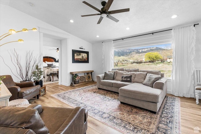 140 S 100 E, Wales, UT 84667 - living area with light wood-style flooring, a ceiling fan, vaulted ceiling, and recessed lighting