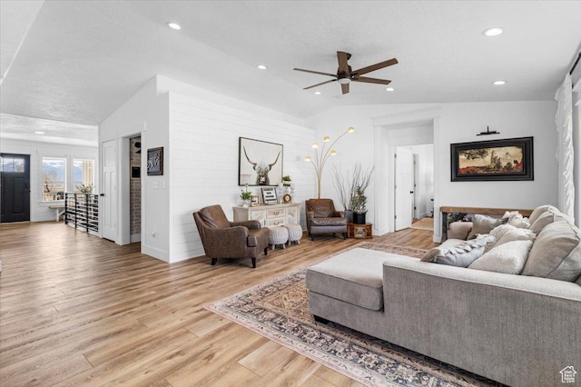 140 S 100 E, Wales, UT 84667 - living room with light wood-type flooring, vaulted ceiling, recessed lighting, a textured ceiling, and a ceiling fan