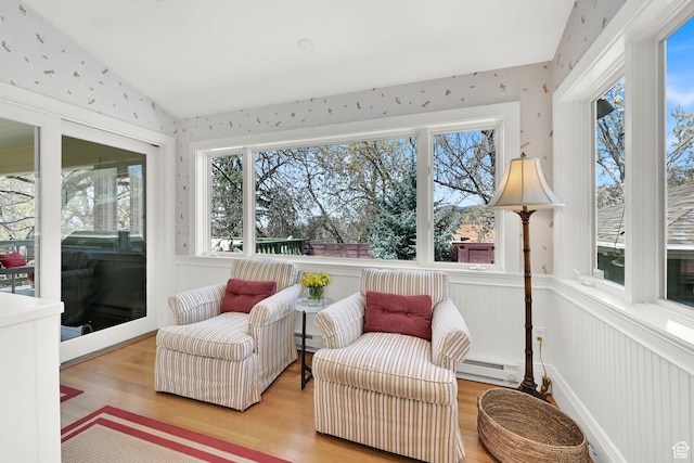 1401 E Sigsbee Ave, Salt Lake City, UT 84103 - sunroom / solarium with wood finished floors, a baseboard heating unit, wallpapered walls, and vaulted ceiling