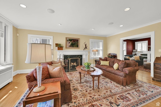 1401 E Sigsbee Ave, Salt Lake City, UT 84103 - living room with crown molding, wood finished floors, and a high end fireplace