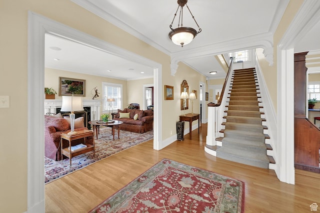 1401 E Sigsbee Ave, Salt Lake City, UT 84103 - foyer featuring wood finished floors, stairs, ornamental molding, and a wealth of natural light