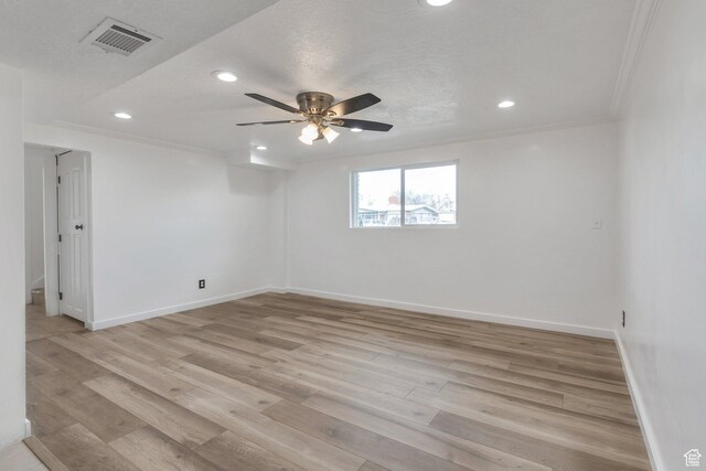 6828 S Georgia Dr, West Jordan, UT 84084 - empty room with recessed lighting, visible vents, and light wood-style flooring