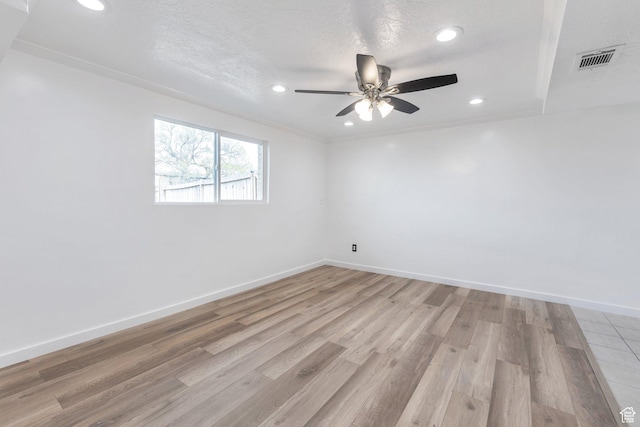 6828 S Georgia Dr, West Jordan, UT 84084 - empty room with light wood-type flooring, ornamental molding, a ceiling fan, visible vents, and recessed lighting