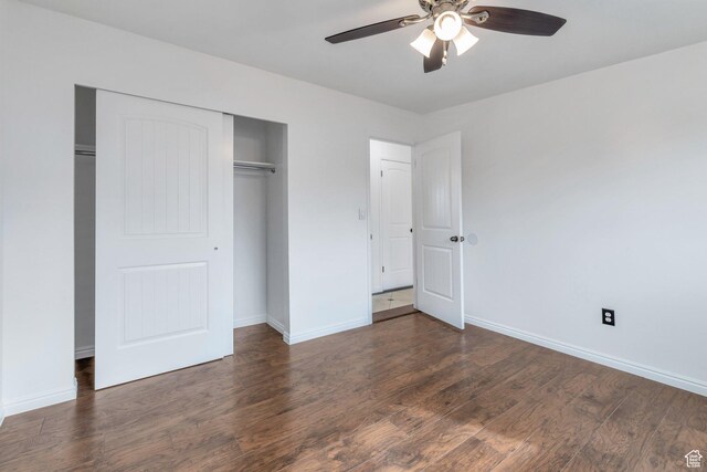 6828 S Georgia Dr, West Jordan, UT 84084 - unfurnished bedroom featuring a closet, wood finished floors, and baseboards
