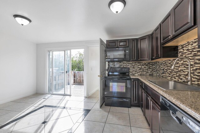 6828 S Georgia Dr, West Jordan, UT 84084 - kitchen with dark brown cabinets, black appliances, a sink, baseboards, and backsplash