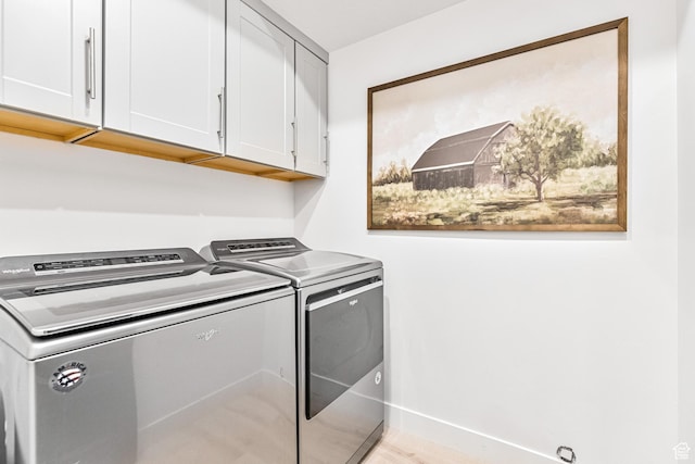 94 S 950 E, Hyde Park, UT 84318 - laundry room featuring separate washer and dryer, baseboards, and cabinet space