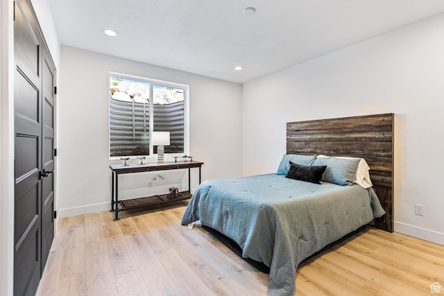 94 S 950 E, Hyde Park, UT 84318 - bedroom with light wood-style floors, baseboards, and recessed lighting