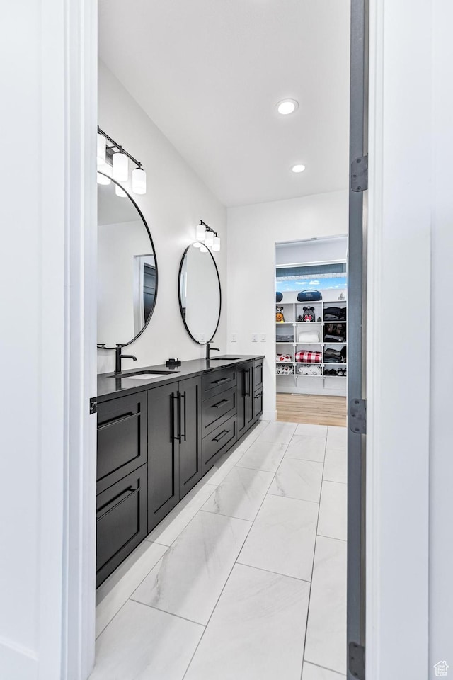 94 S 950 E, Hyde Park, UT 84318 - full bath featuring recessed lighting, double vanity, a sink, and a walk in closet