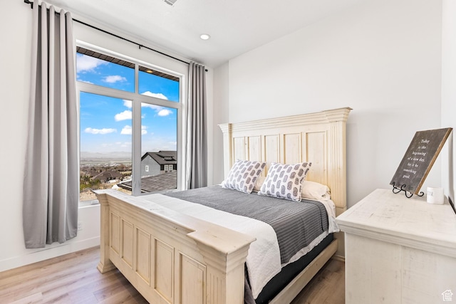 94 S 950 E, Hyde Park, UT 84318 - bedroom with recessed lighting, light wood-style flooring, multiple windows, and baseboards