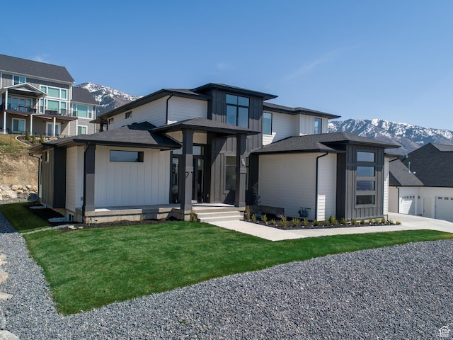 94 S 950 E, Hyde Park, UT 84318 - prairie-style home featuring roof with shingles, a mountain view, and a front yard