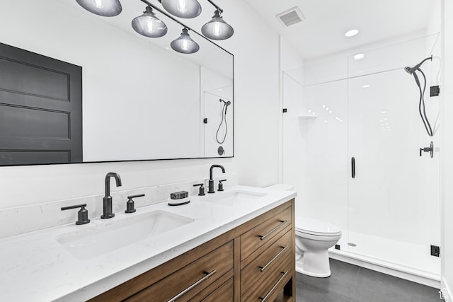 94 S 950 E, Hyde Park, UT 84318 - bathroom featuring a shower stall, double vanity, a sink, and visible vents