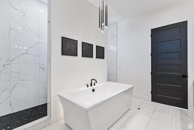 94 S 950 E, Hyde Park, UT 84318 - bathroom featuring a freestanding bath, a marble finish shower, and baseboards