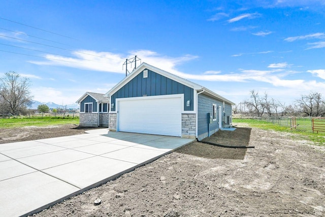 3005 W 3300 S, West Haven, UT 84401 - garage featuring driveway and fence