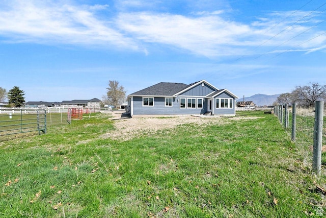 3005 W 3300 S, West Haven, UT 84401 - rear view of property featuring a yard and fence