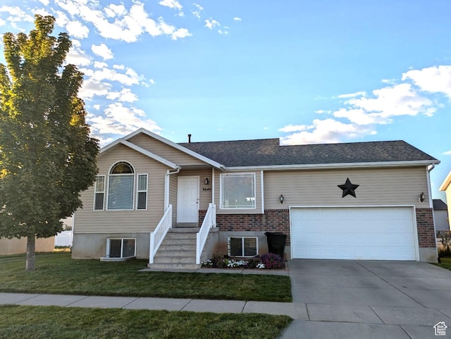 ranch-style house with a front yard, an attached garage, central AC, and driveway
