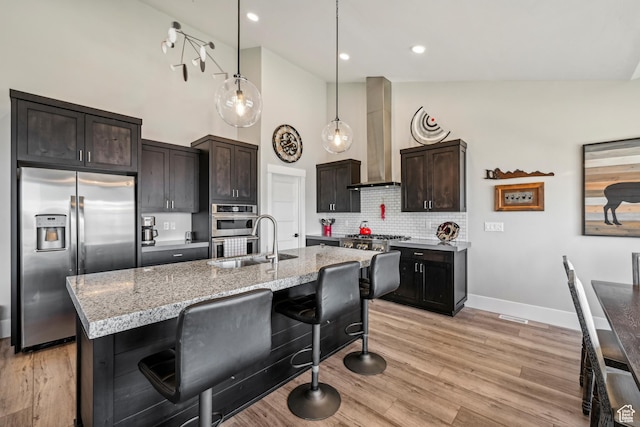 11285 N Shoreline Ct, Hideout, UT 84036 - kitchen with tasteful backsplash, wall chimney range hood, a high ceiling, stainless steel appliances, and a sink