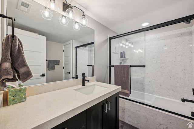 11285 N Shoreline Ct, Hideout, UT 84036 - bathroom with visible vents, vanity, and enclosed tub / shower combo