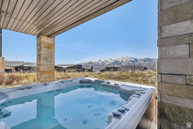 11285 N Shoreline Ct, Hideout, UT 84036 - view of swimming pool with a mountain view and a hot tub