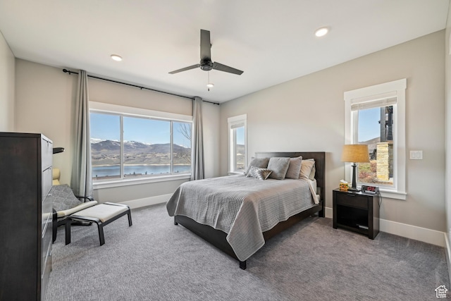 11285 N Shoreline Ct, Hideout, UT 84036 - bedroom with baseboards, multiple windows, and carpet flooring