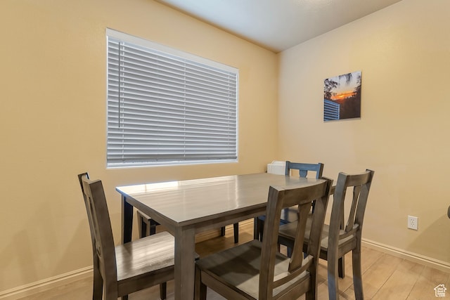 2930 E 450 N Unit F6, St George, UT 84790 - dining area featuring light wood-style flooring and baseboards