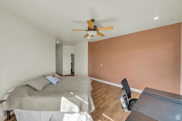 bedroom with recessed lighting, light wood-type flooring, baseboards, and ceiling fan