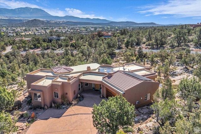 drone / aerial view featuring a mountain view