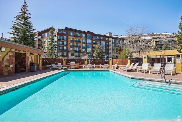 3720 N Sundial Ct Unit Cg02, Park City, UT 84098 - community pool featuring a patio and fence