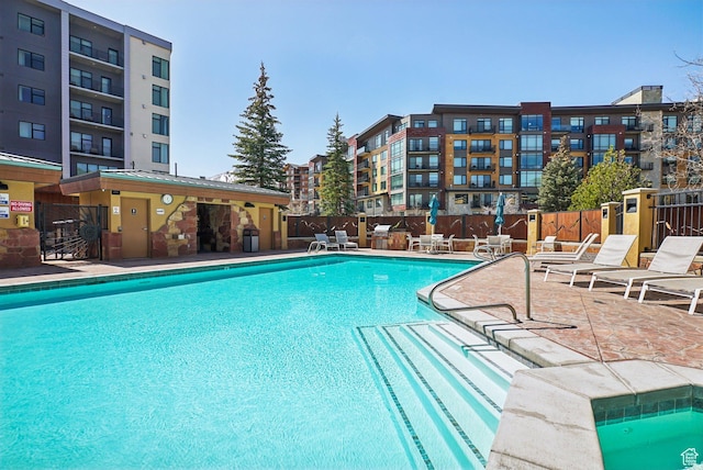 3720 N Sundial Ct Unit Cg02, Park City, UT 84098 - community pool featuring a patio and fence