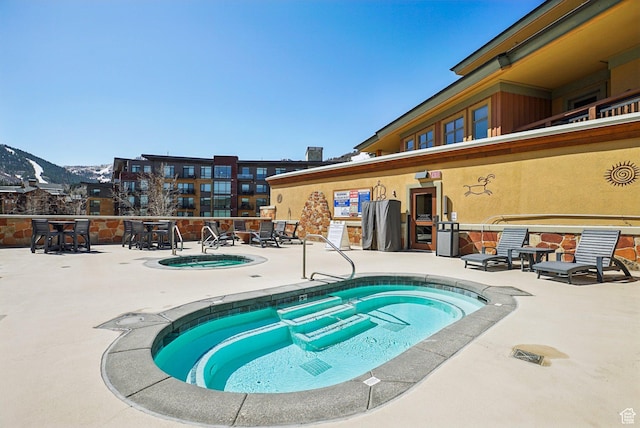 3720 N Sundial Ct Unit Cg02, Park City, UT 84098 - view of swimming pool featuring a patio area and a hot tub