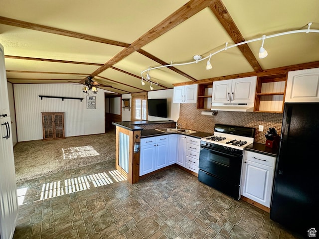 967 E Rudder St Unit 53, Garden City, UT 84028 - kitchen featuring freestanding refrigerator, open shelves, dark countertops, range with gas cooktop, and vaulted ceiling with beams