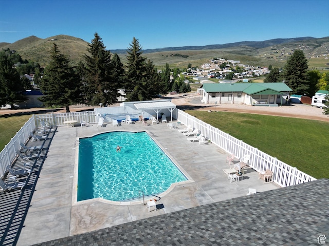 967 E Rudder St Unit 53, Garden City, UT 84028 - community pool with a mountain view, a pergola, fence, and a patio area