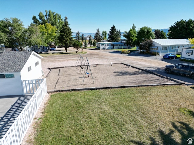 967 E Rudder St Unit 53, Garden City, UT 84028 - view of yard with fence, a residential view, and playground community