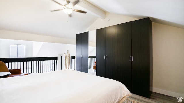 1530 Empire Ave Unit 302, Park City, UT 84060 - bedroom featuring ceiling fan, light wood-style floors, baseboards, and lofted ceiling with beams