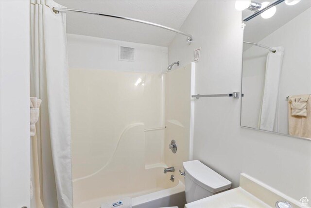 2176 S Bear Blvd, Garden City, UT 84028 - full bath featuring shower / bath combo, visible vents, and toilet